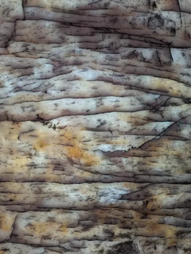 a backlit panel banded like weathered timber
