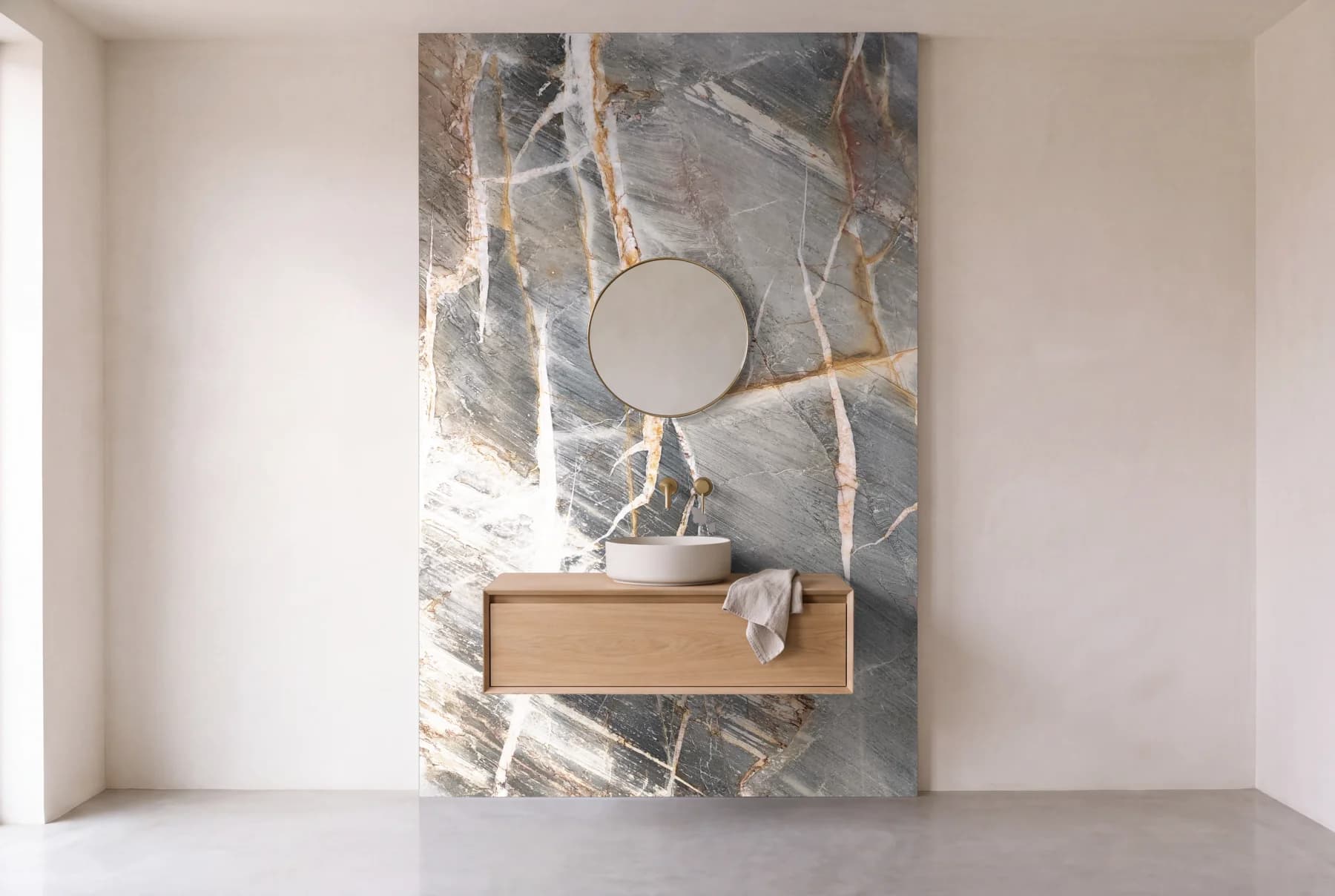 Zanari quartzite as one slab behind a floating oak vanity, visualized