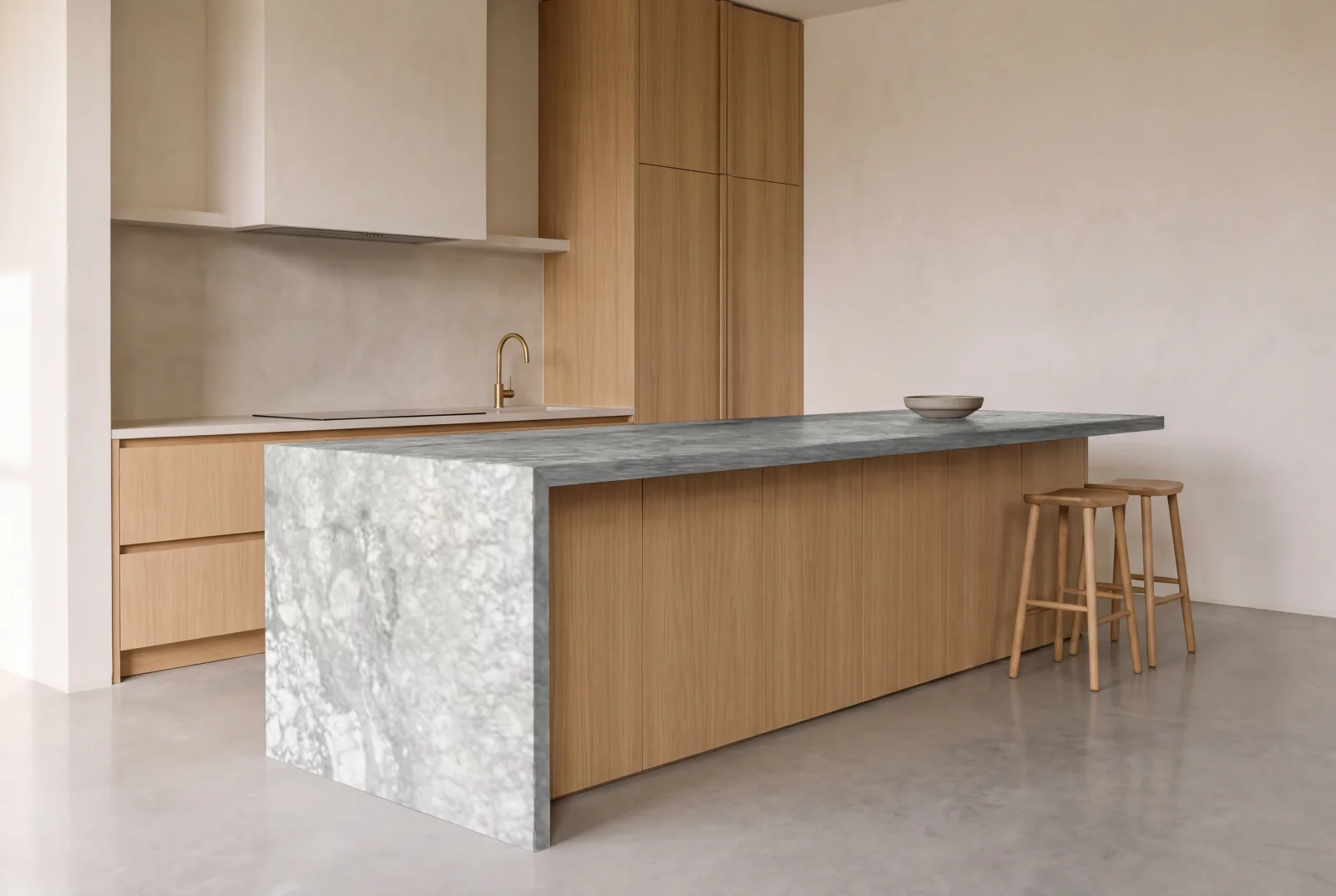 Visualization of Bianco Vagli as a waterfall island in an oak kitchen