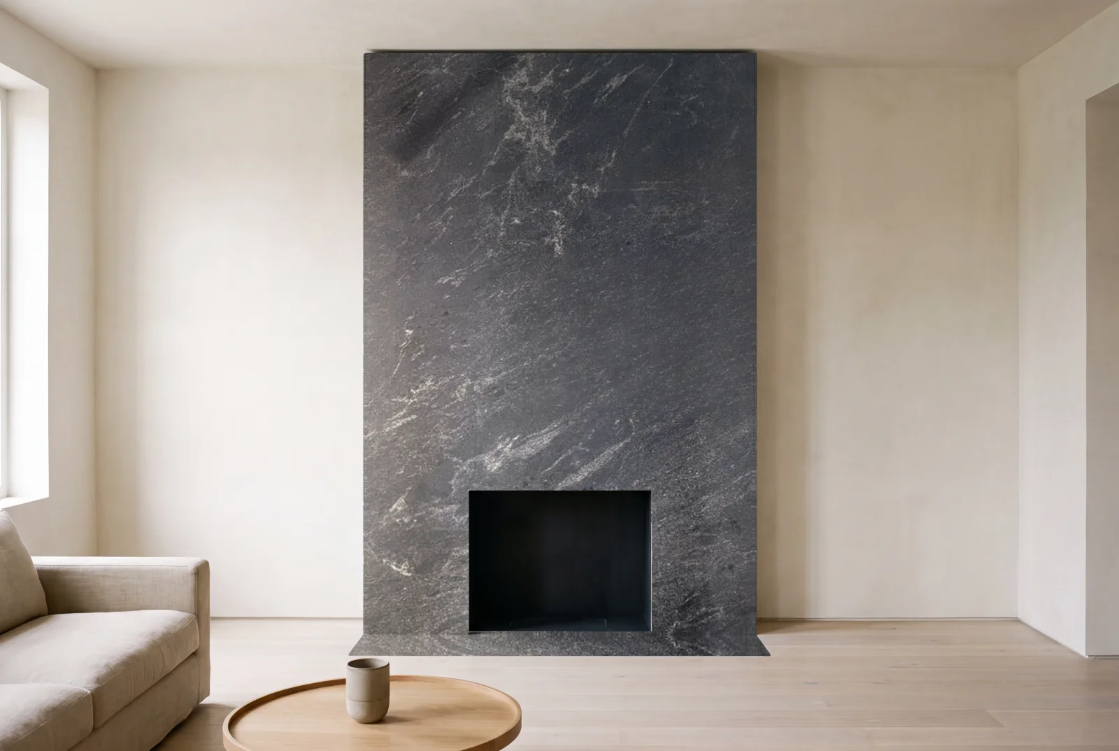 Visualization of Black Mist Honed as a floor-to-ceiling fireplace wall in a living room