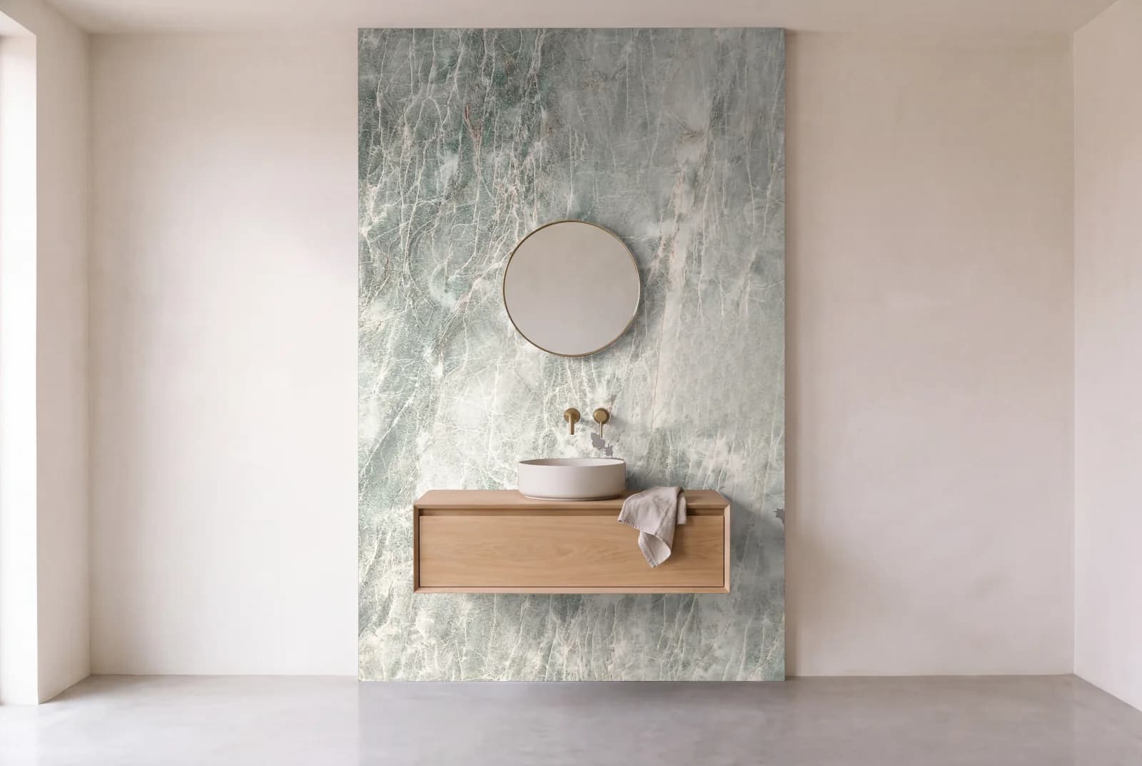 Visualization of Emerald Green as one slab behind a floating bathroom vanity