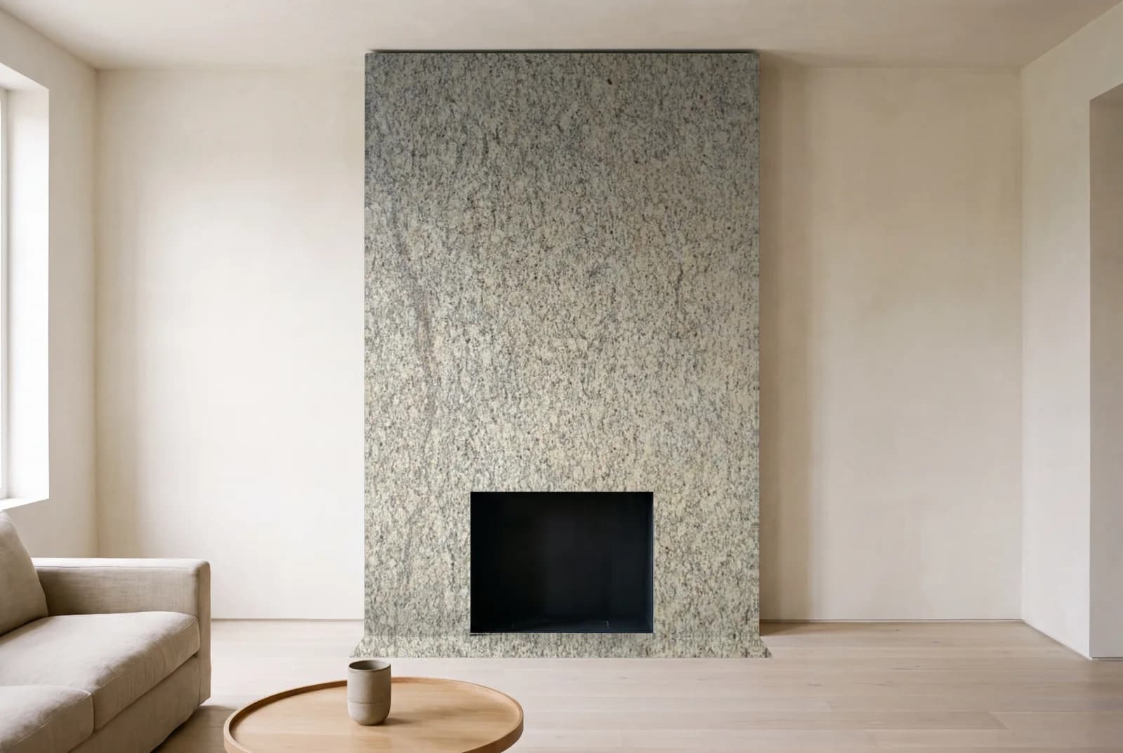 Visualization of Giallo Napole as a floor-to-ceiling fireplace wall in a living room