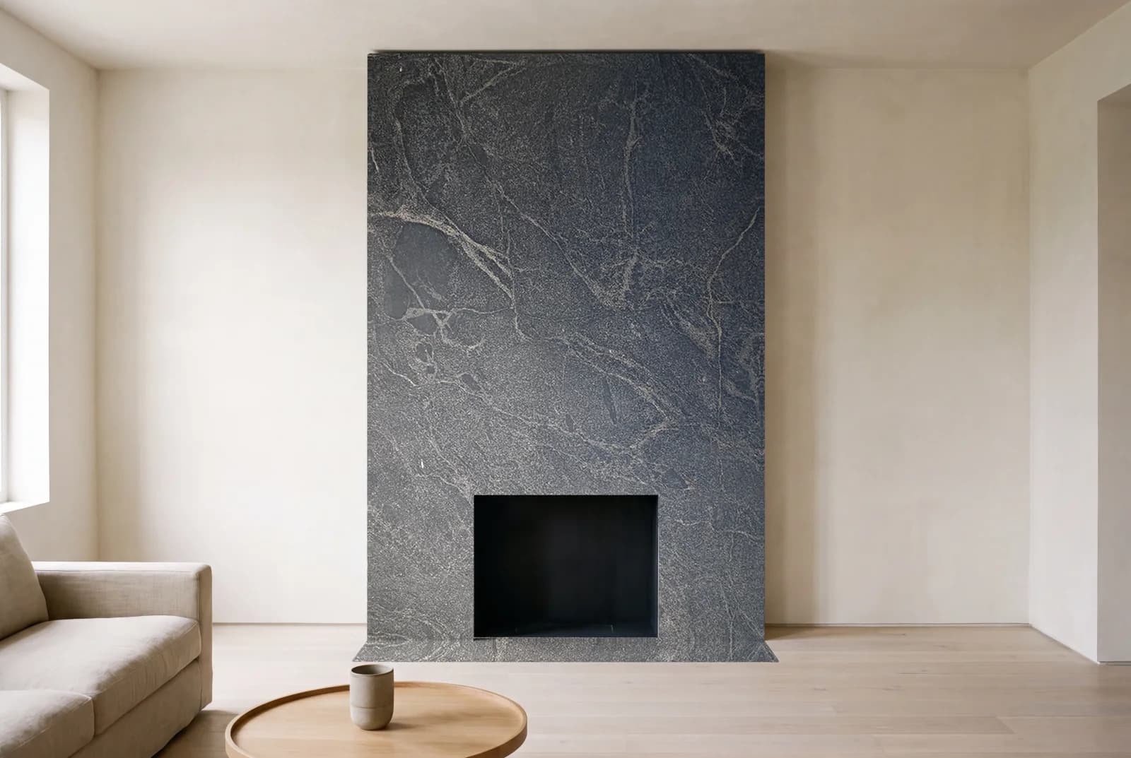 Visualization of Nero Mist Honed as a floor-to-ceiling fireplace wall in a living room