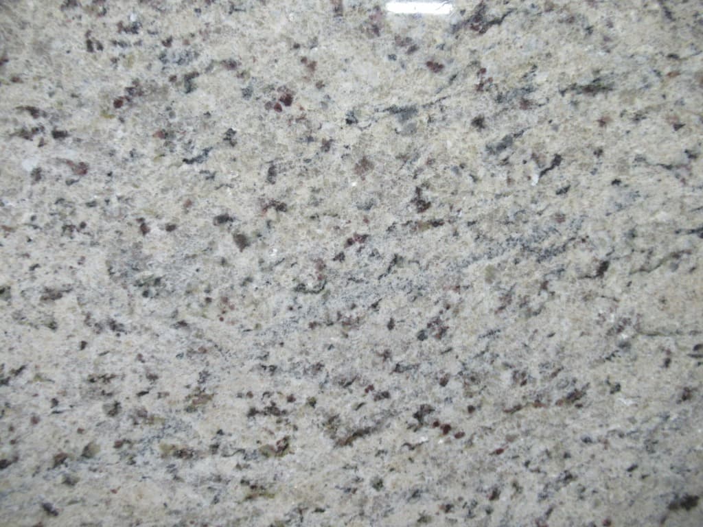 Giallo Real, a granite slab, at KLZ Stone Supply in Dallas