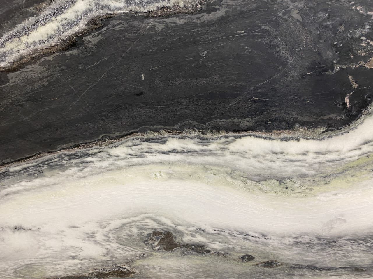 Panda Leather, a marble slab, at KLZ Stone Supply in Dallas