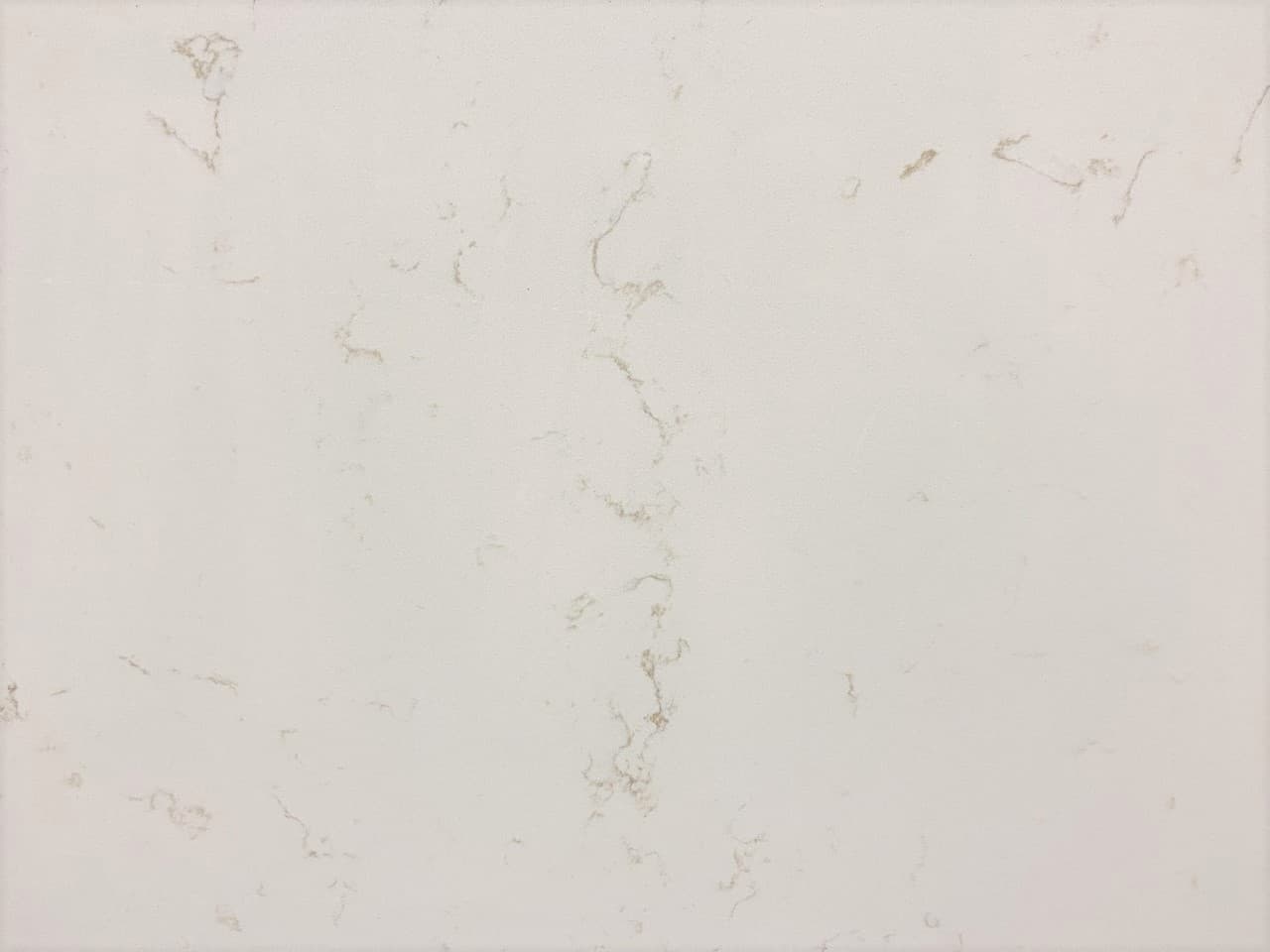 Carrara Gold SP, a quartz slab, at KLZ Stone Supply in Dallas