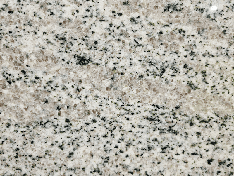 Meera White, a granite slab, at KLZ Stone Supply in Dallas