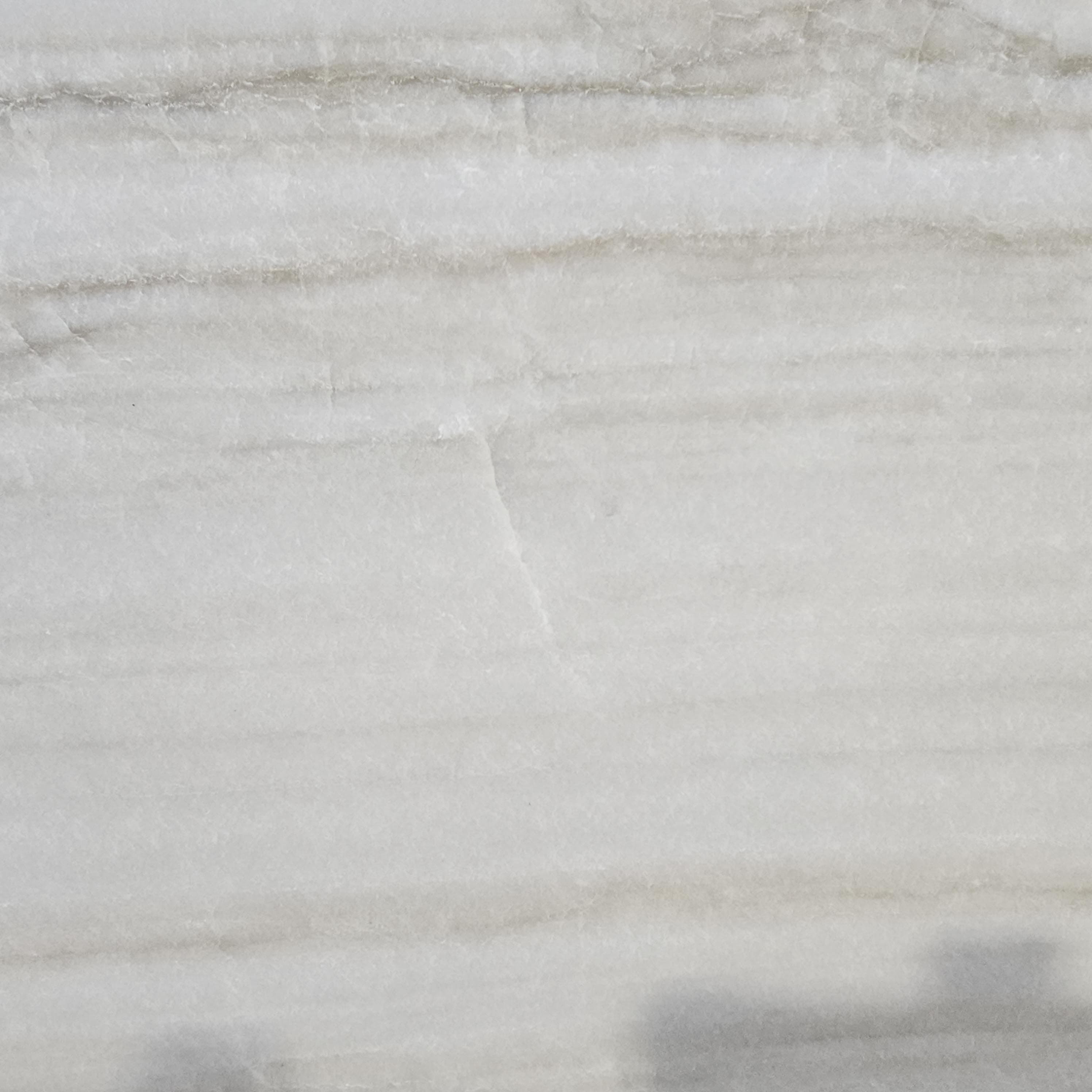 White Macaubas Honed, a quartzite slab, at KLZ Stone Supply in Dallas