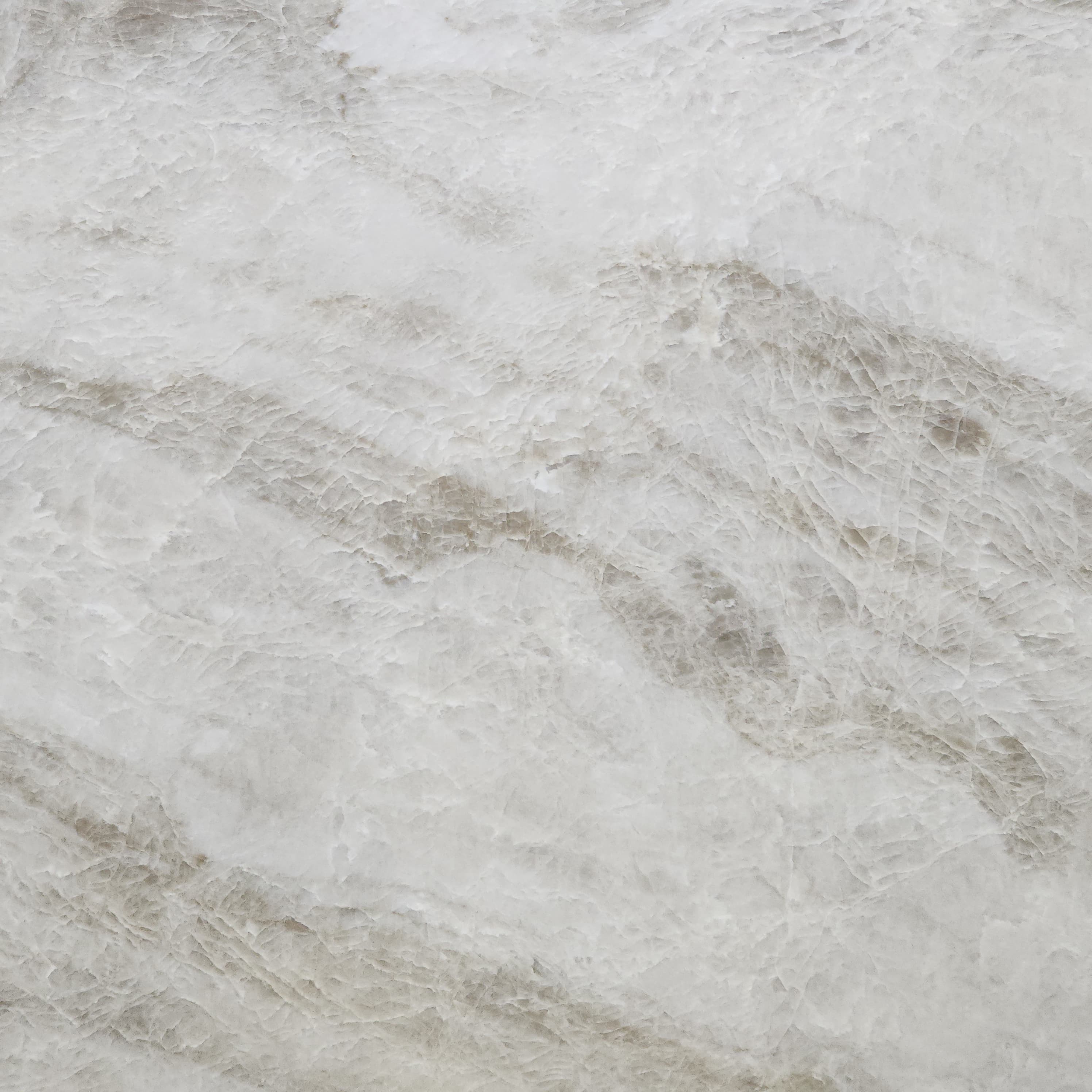 Taj Mahal Premium Leather, a quartzite slab, at KLZ Stone Supply in Dallas
