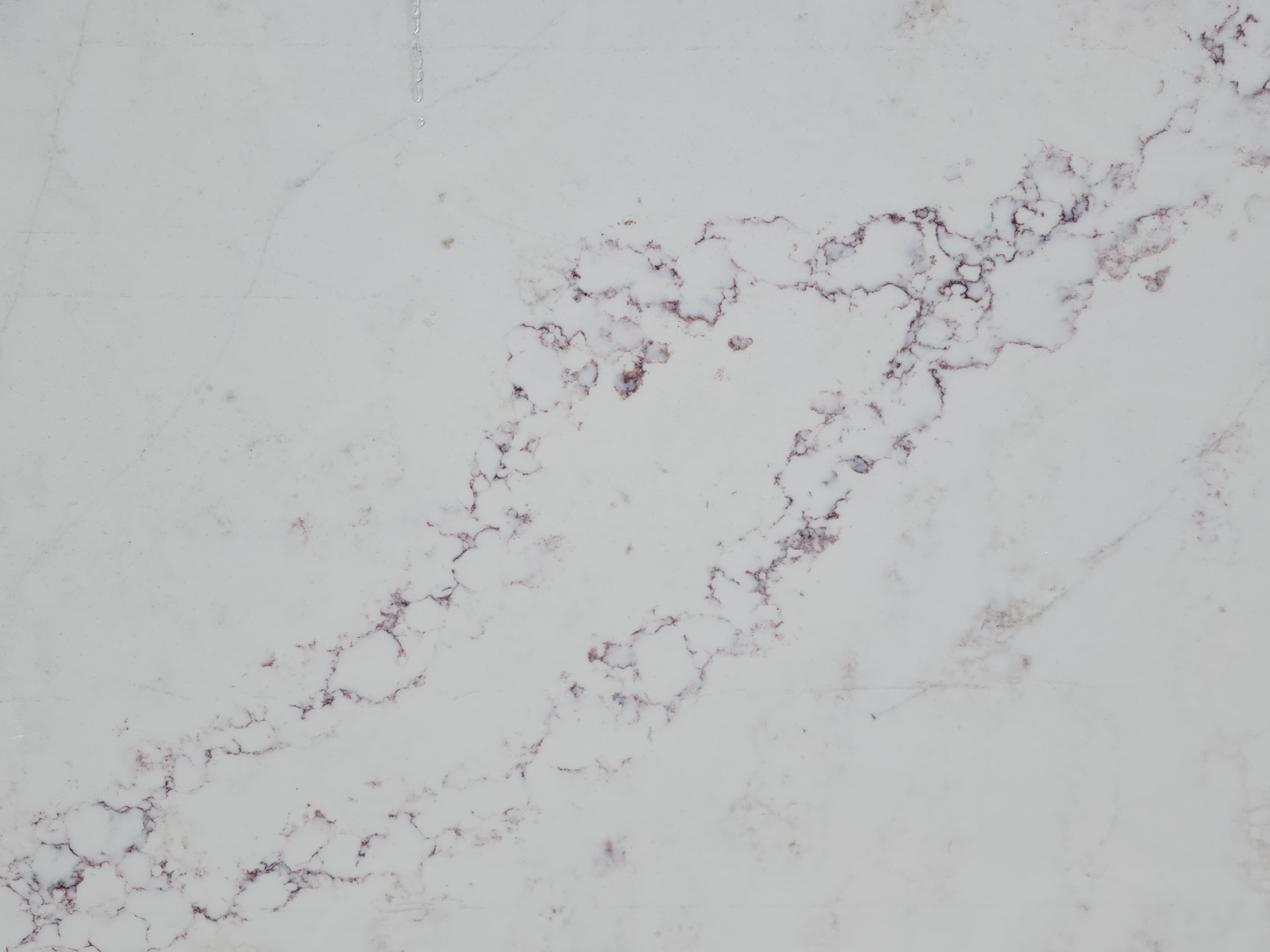 Azzura Claret, a quartz slab, at KLZ Stone Supply in Dallas