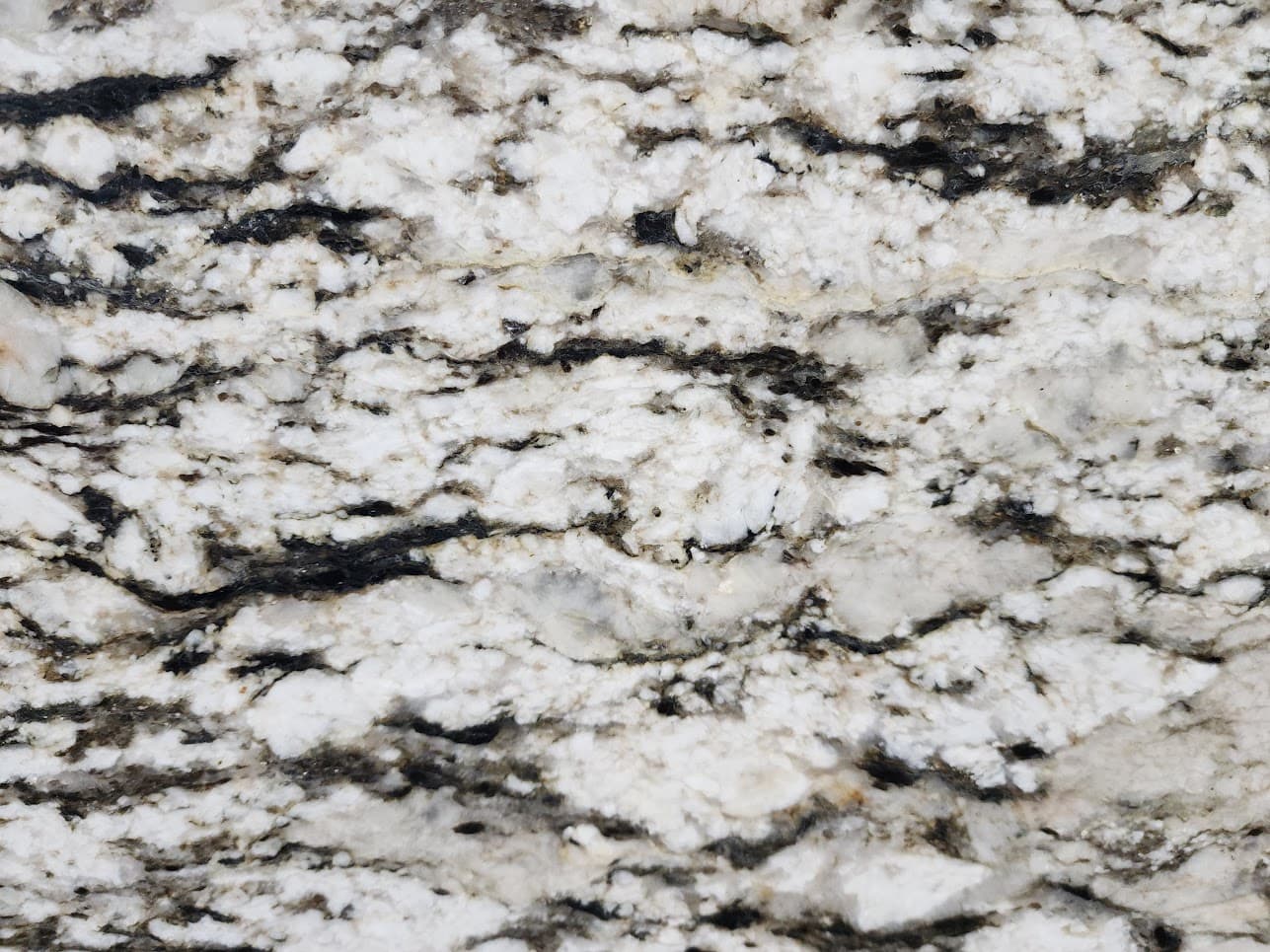 Canyon Sunset, a granite slab, at KLZ Stone Supply in Dallas